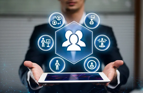 Man in suit holding a tablet. Various graphic elements overlayed